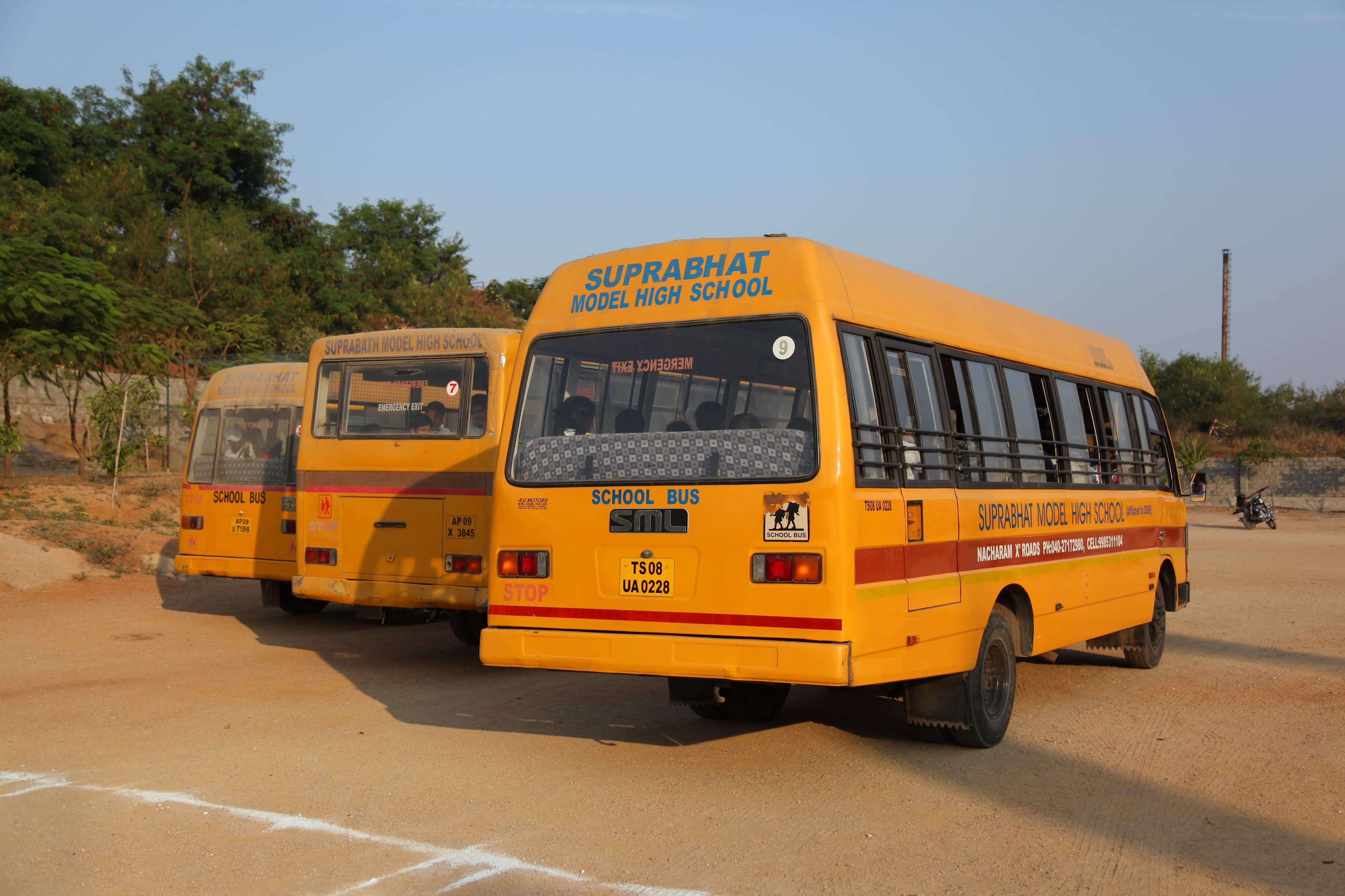 SMHS branded yellow school buses
