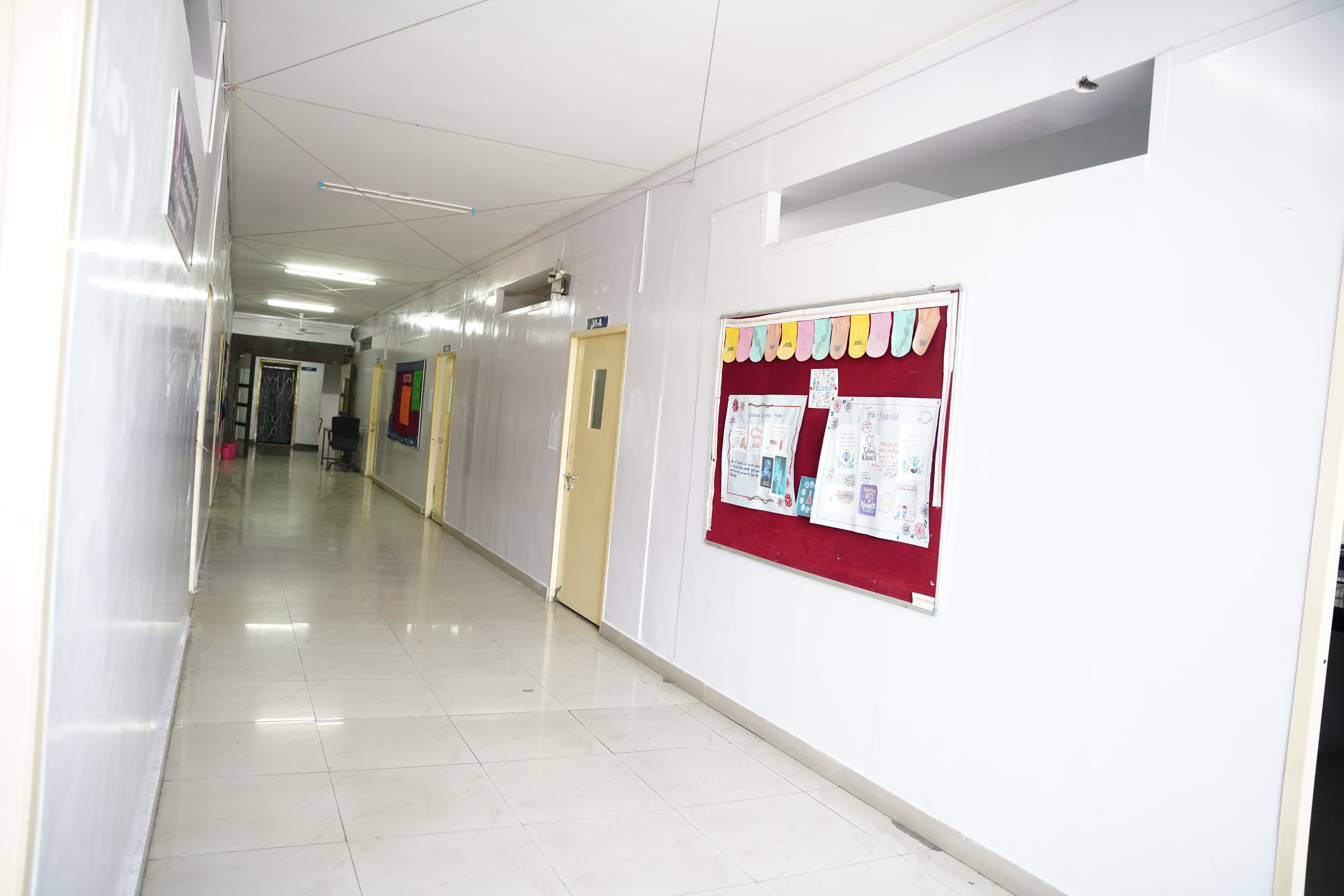 Corridor with CCTV and bulletin board